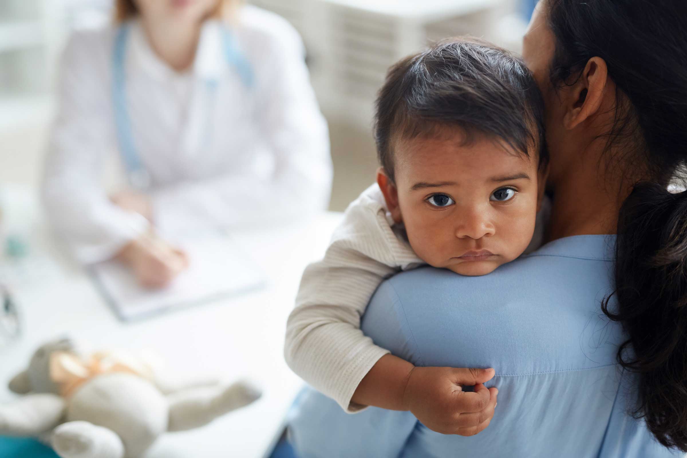 Parent and Baby Talking to Provider