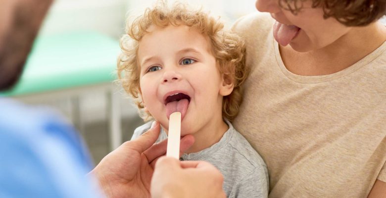 Provider Examining Child's Throat